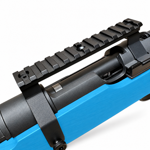 Black scope mount rail fitted to a blue bolt action toy rifle